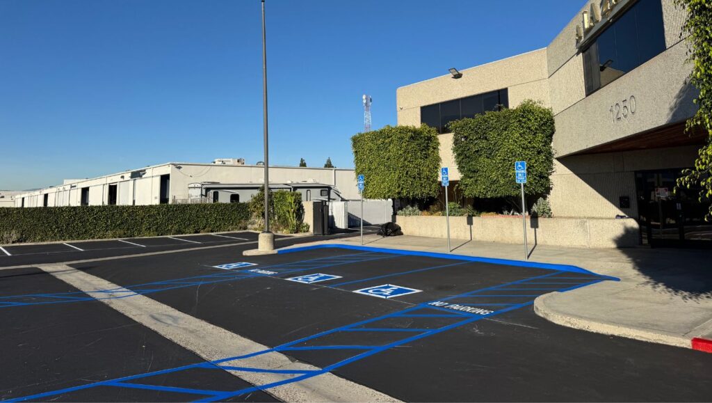 ada compliance parking spots freshly painted for Vermillion Construction parking lot