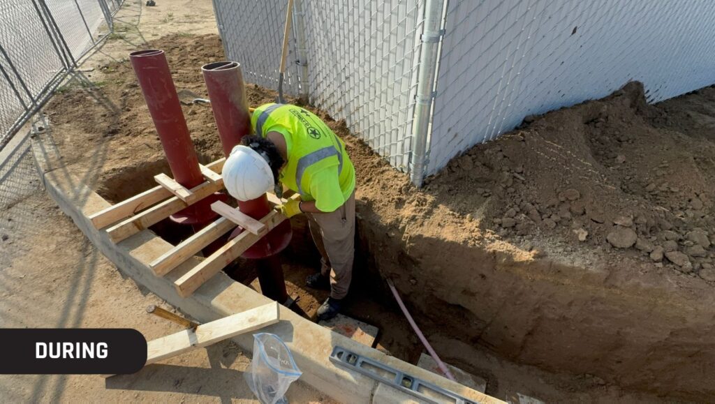 G-FORCE® employee installing bollards for Holts Renewables