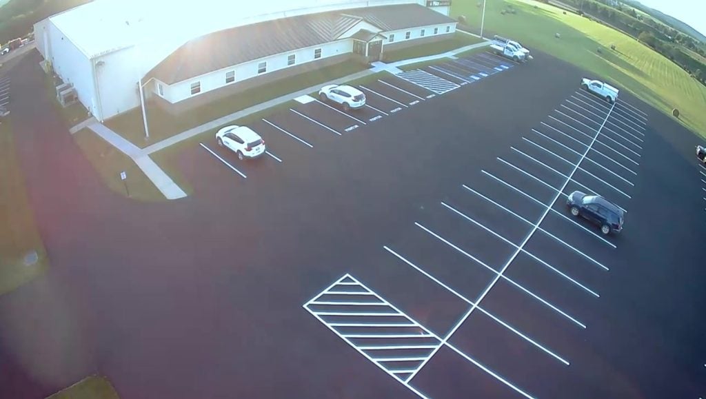 newly striped rows of parking stalls at pillar innovations