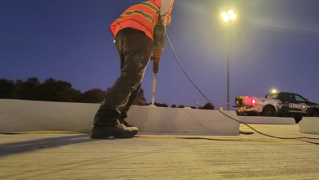 wheel stop install at night