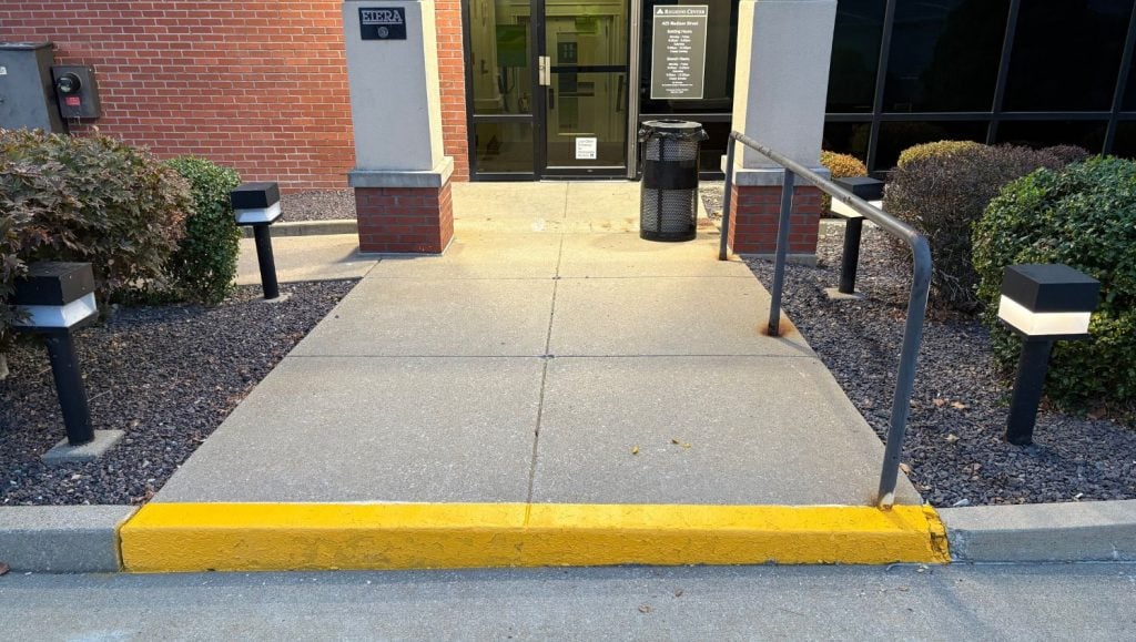front view of stairs freshly painted for Regions Bank