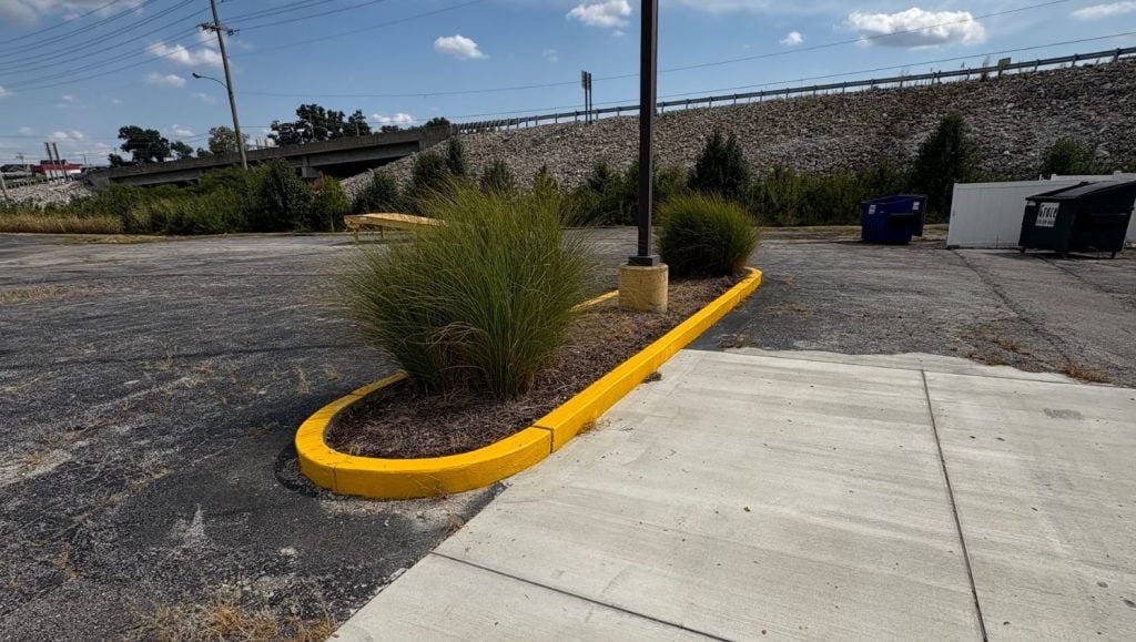 freshly painted yellow line markings for Rion Equipment parking lot