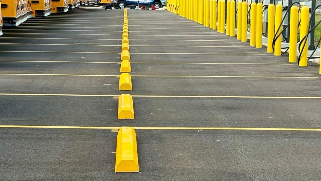 parking stops installation for North America Central School Bus