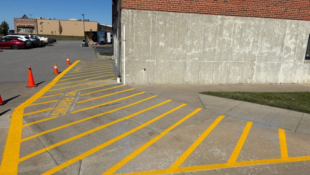 line markings freshly painted for Our Lady of Lourdes Catholic Church parking lot
