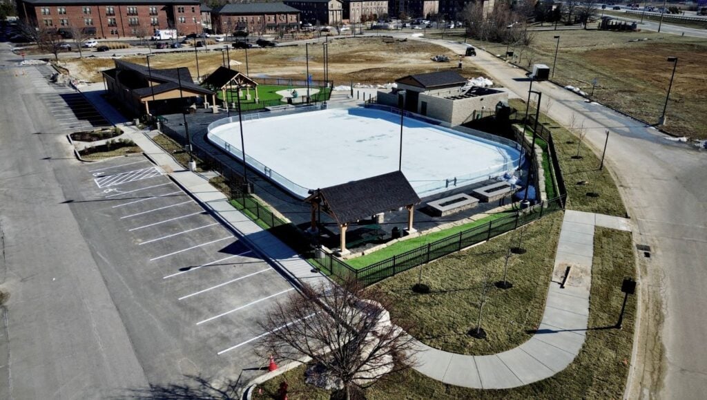 parking spots freshly painted for Meadows Park and Ice Rink parking lot aerial view