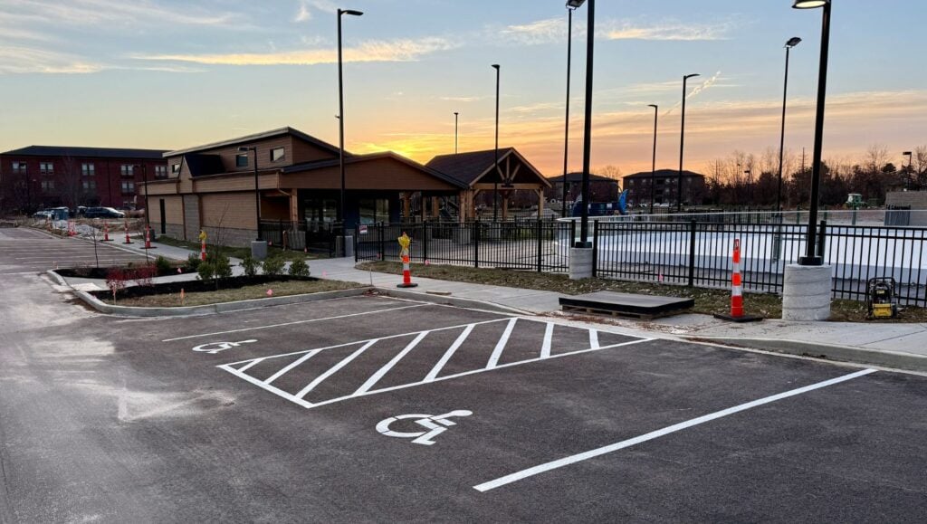 Meadows Park and Ice Rink parking lot with freshly painted ada compliance parking spots