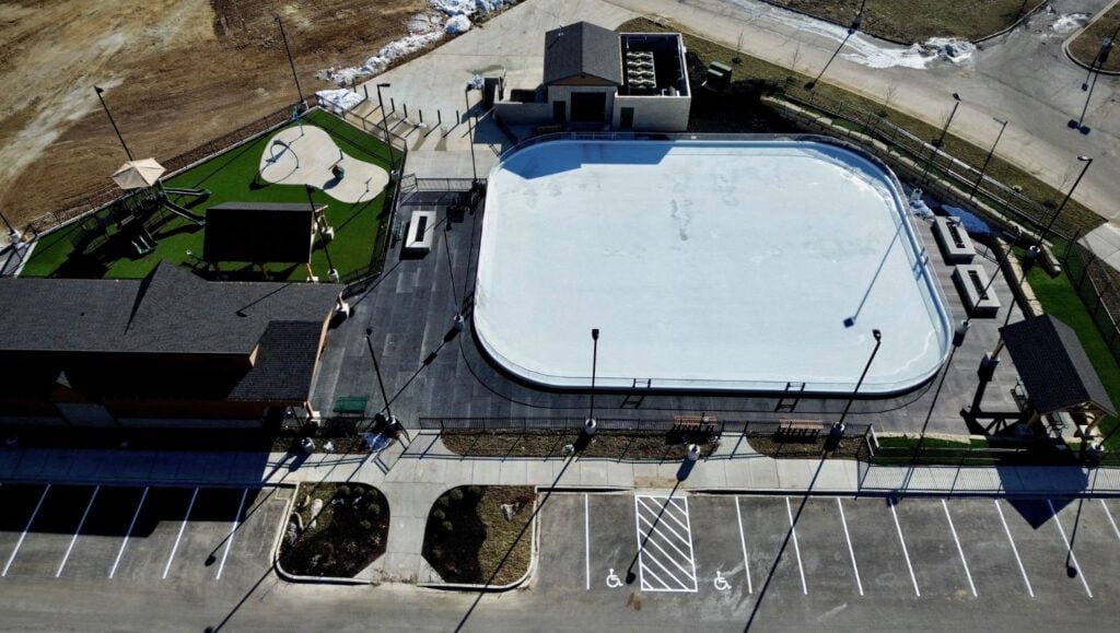 aerial view of Meadows Park and Ice Rink parking lot freshly painted
