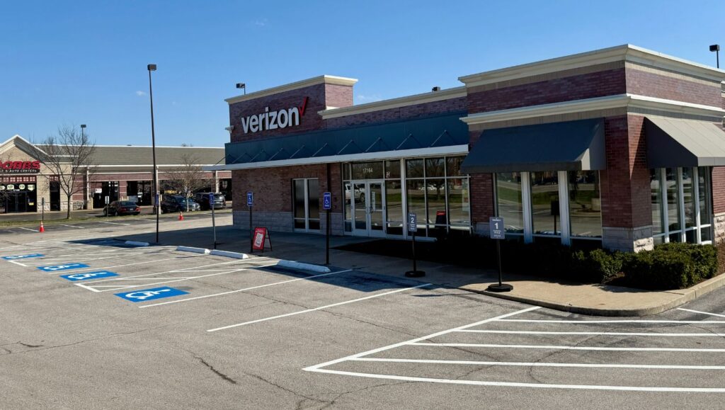 parking spots freshly painted for Verizon