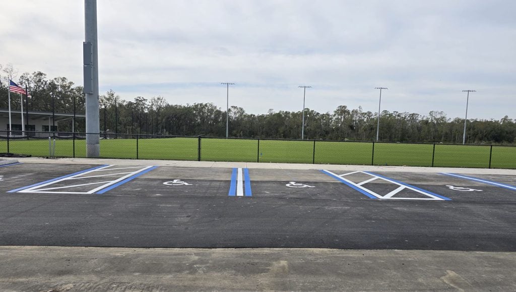 close-up of ada compliance parking spot freshly painted for a park