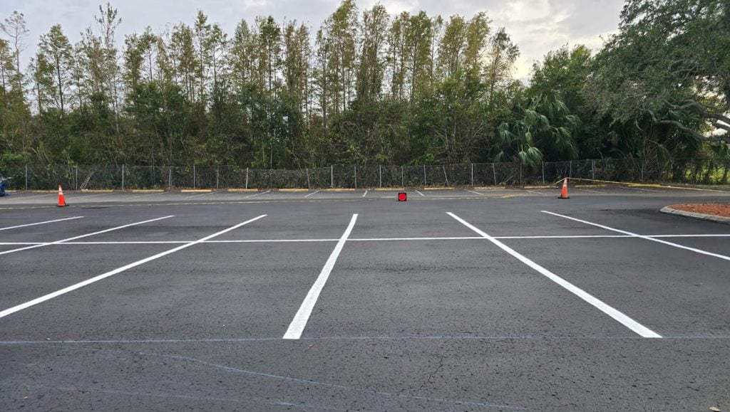 school parking lot with freshly painted line markings