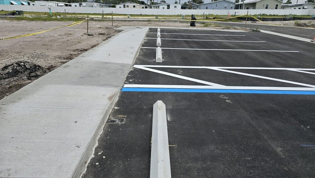 parking stops installed for townhomes parking lot