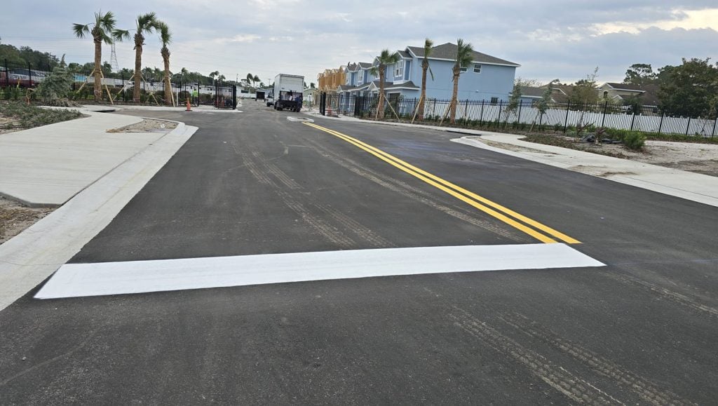 close-up of ada compliance parking spots freshly painted for townhomes parking lot