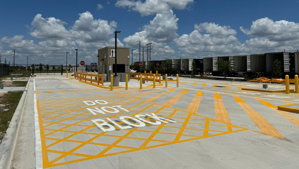 parking lot markings for amazon warehouse while its raining