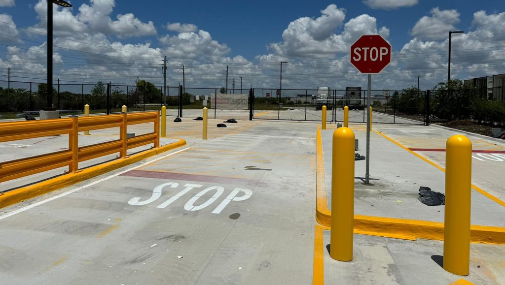 freshly painted parking lot markings for amazon warehouse