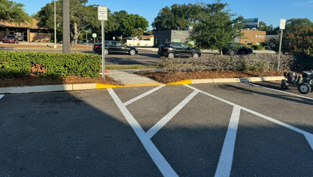 crosswalk freshly painted on apartment complex parking lot
