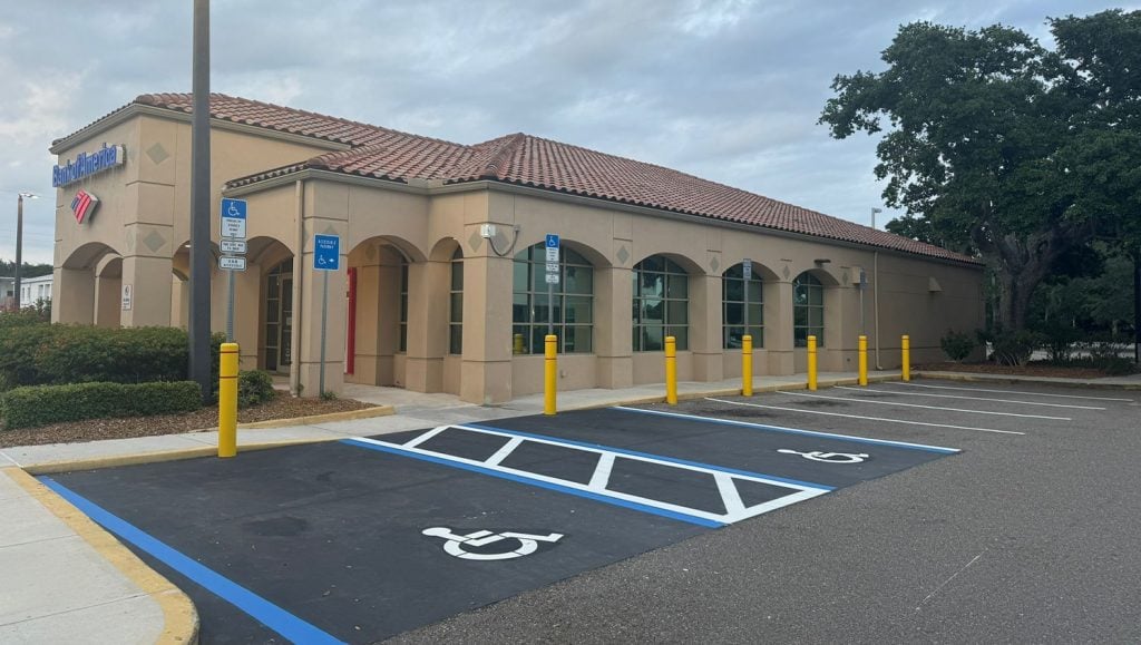 side view of bank of america parking lot with freshly painted lines