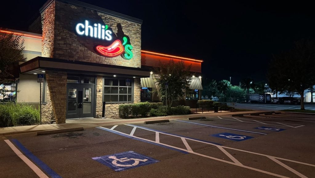 freshly painted curb and line markings for chilis parking lot