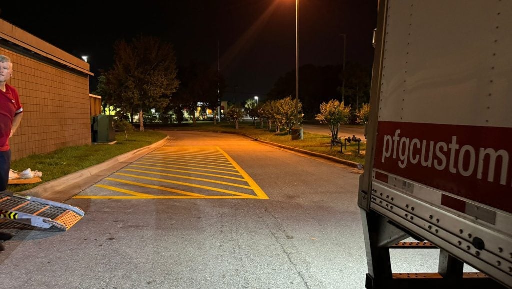side view of chilis parking lot at dusk