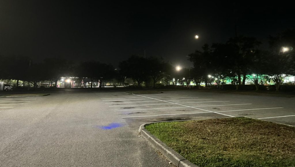 cones in front of freshly painted lines at goodwill parking lot
