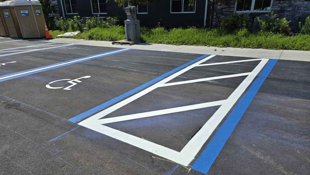 freshly painted parking spots for apartment complex