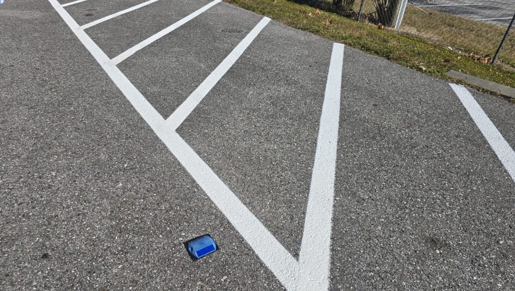 freshly painted line markings for apartments close-up