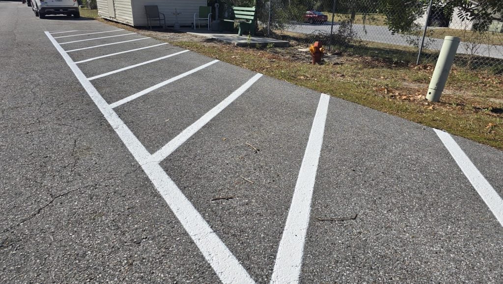 freshly painted line striping for apartments parking lot