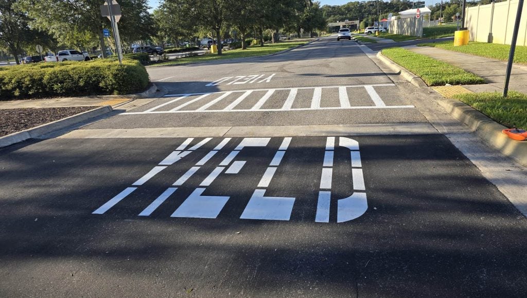 freshly painted yellow markings for Chick-fil-A drive thru