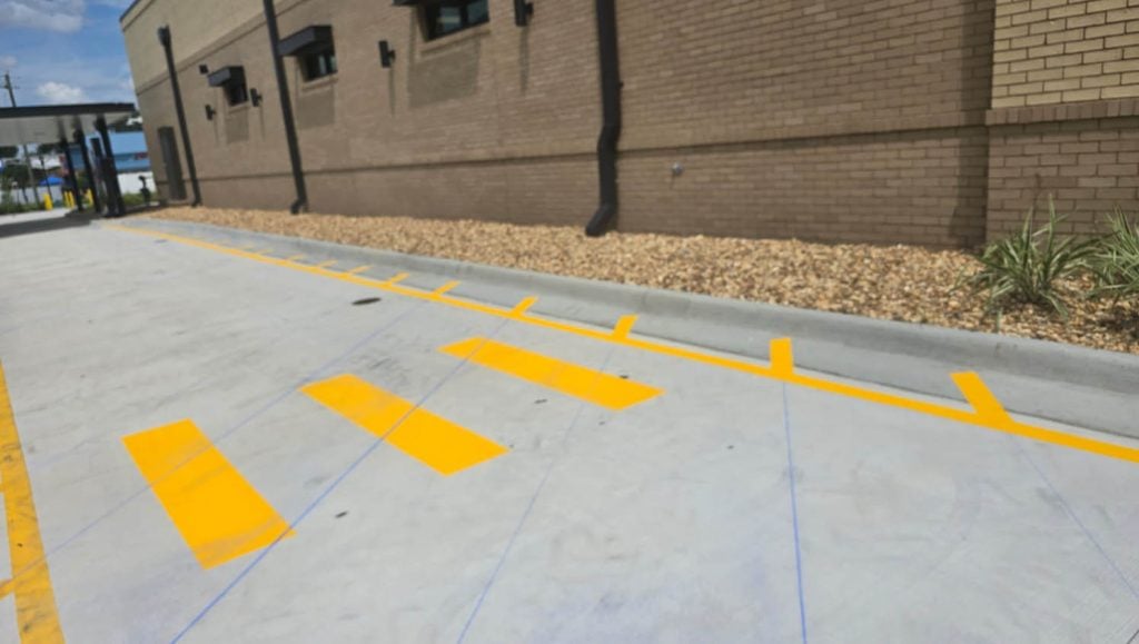 close-up of crosswalk markings for Chick-fil-A