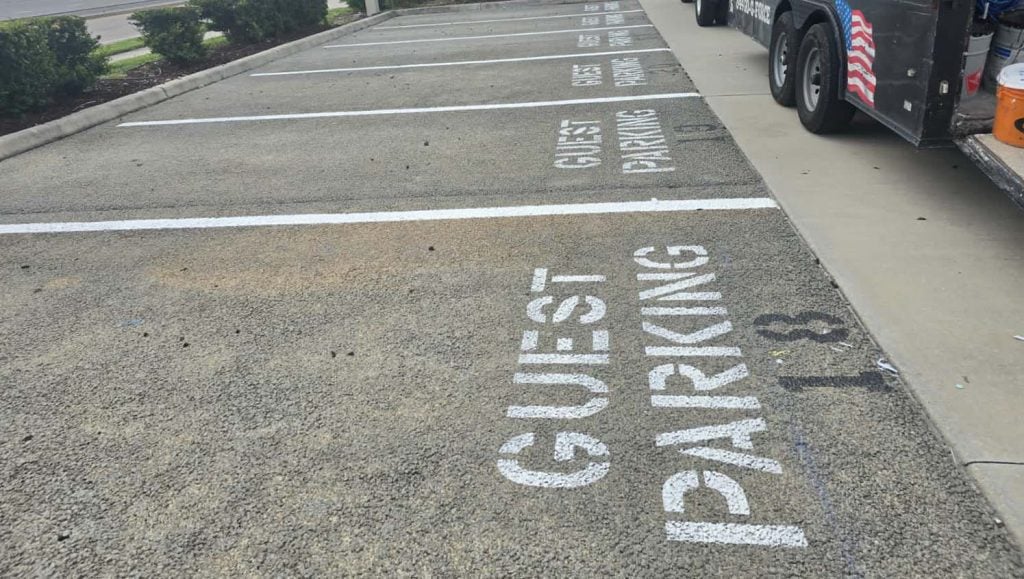 guest parking spots freshly painted for business parking lot