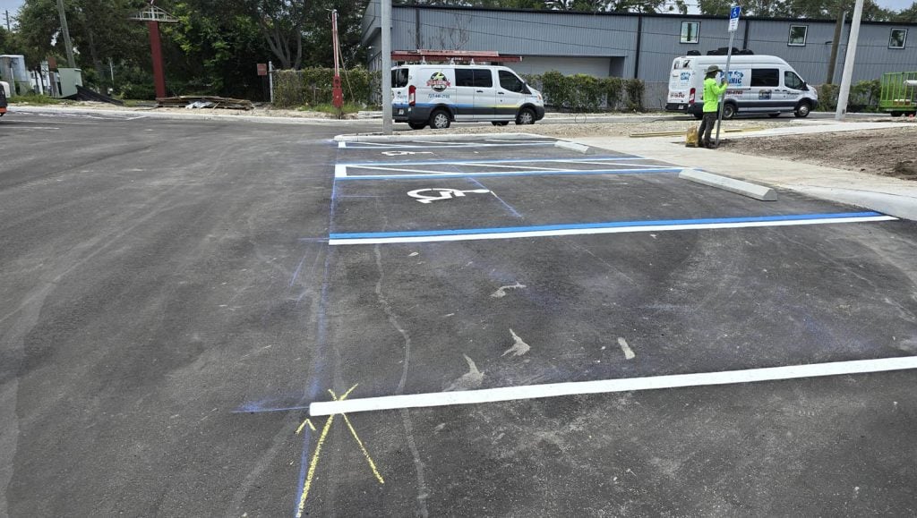 Business office parking lot with freshly painted parking spots