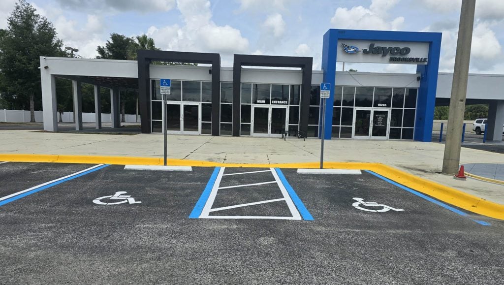 freshly painted curb for Jayco