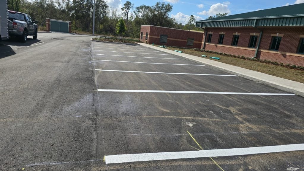 side view of freshly painted parking spots for Pasco Fire Station