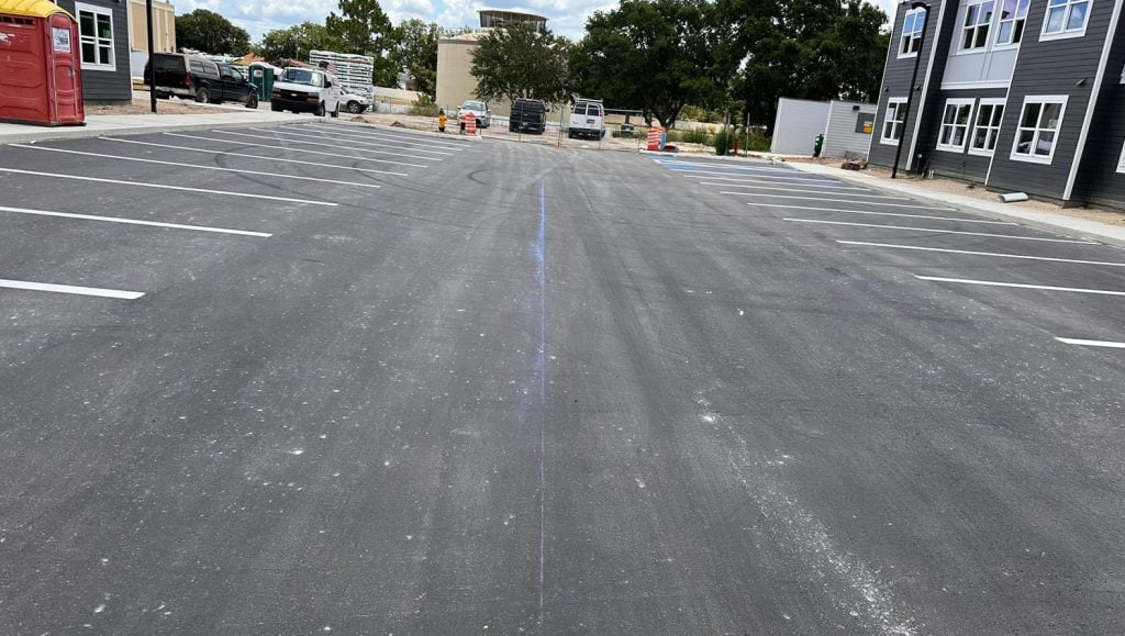 apartment complex with freshly painted line markings