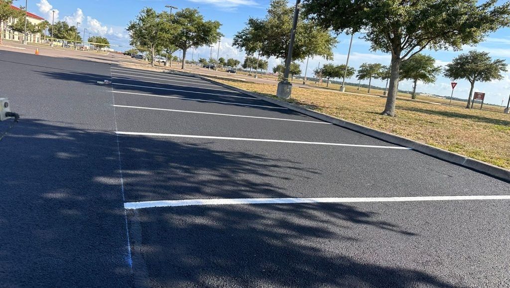 freshly painted parking spot lines close-up