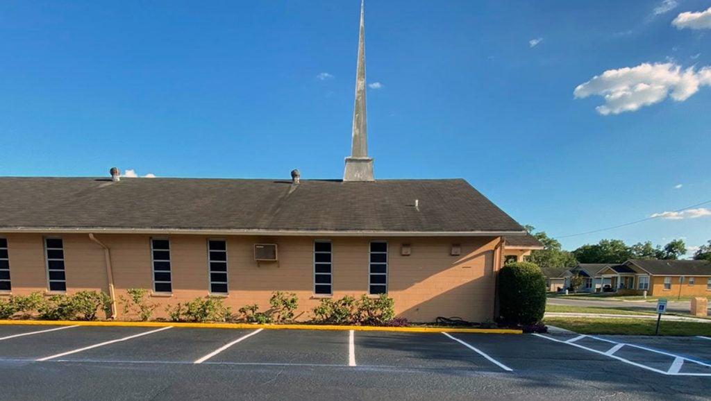 side view of freshly striped parking stalls at a Lakeland, FL church