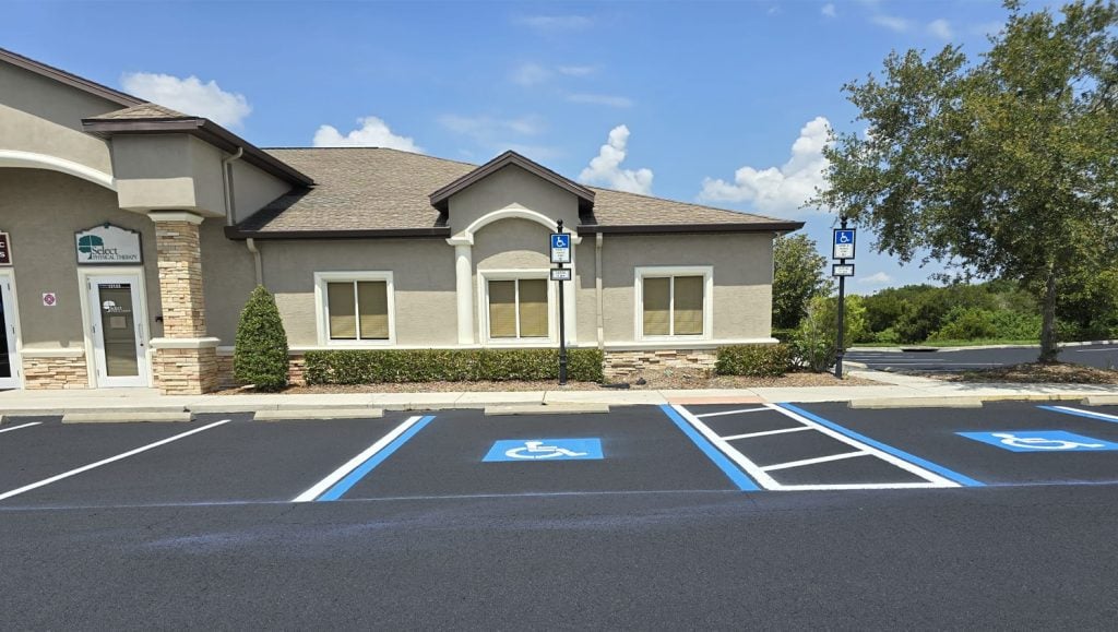 front view of Office District parking lot with freshly painted line markings