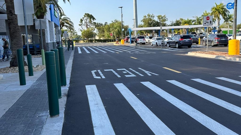 close-up of light post painted yellow at walmart