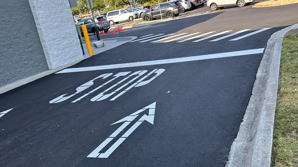close-up of freshly painted markings for walmart parking lot