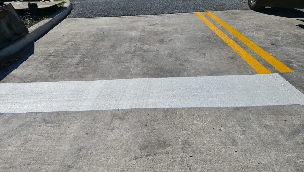 freshly painted line markings for business parking lot