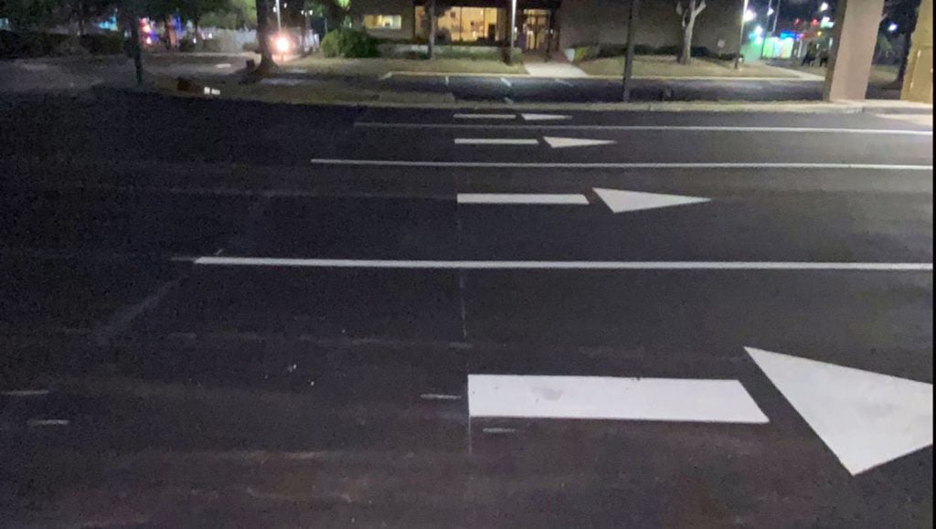 updated patron parking space line striping and curb safety paint at Wells Fargo in Tampa, FL