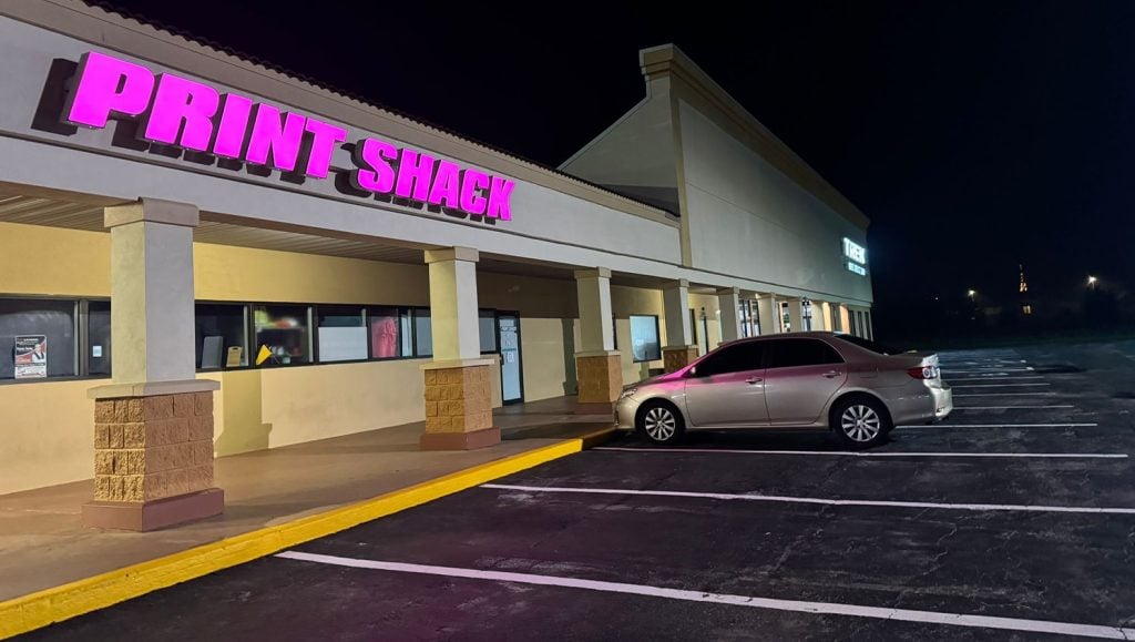 freshly painted white arrows for shopping plaza parking lot