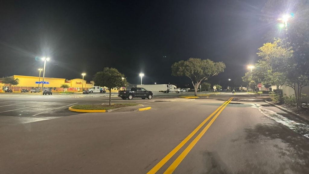 freshly painted white arrows for shopping plaza parking lot