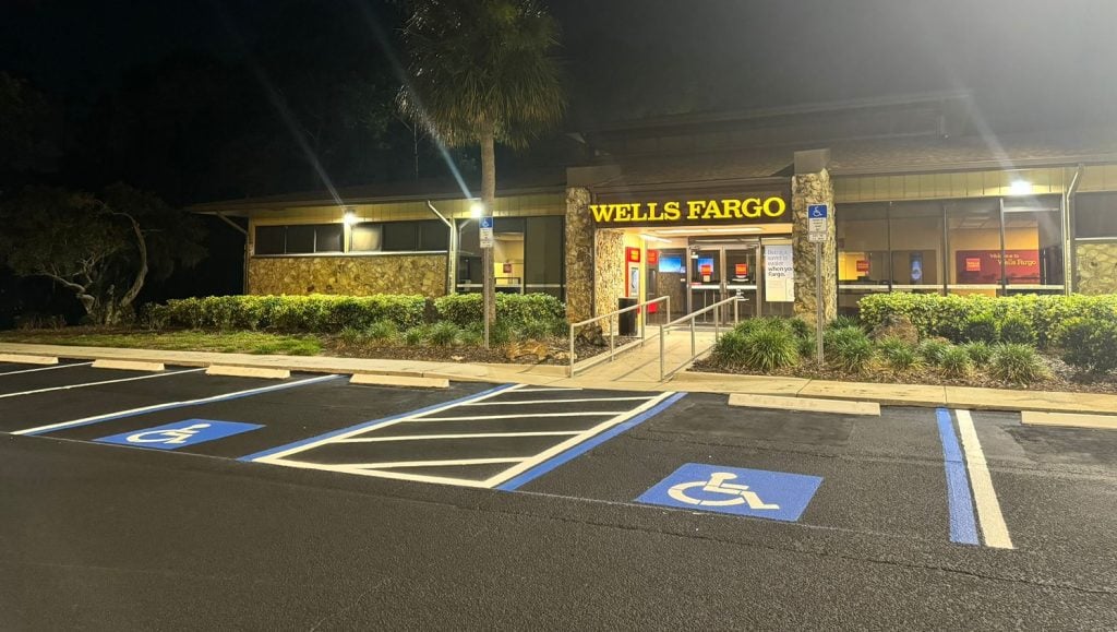 close-up of wells fargo parking lot with freshly painted parking lot lines