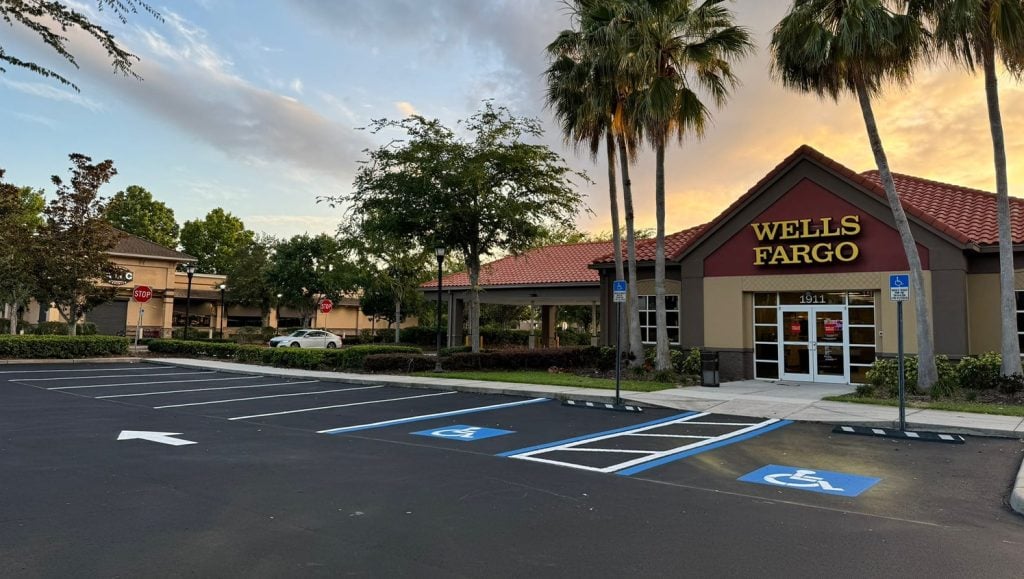 fresh painted white lines and arrow for wells fargo parking lot