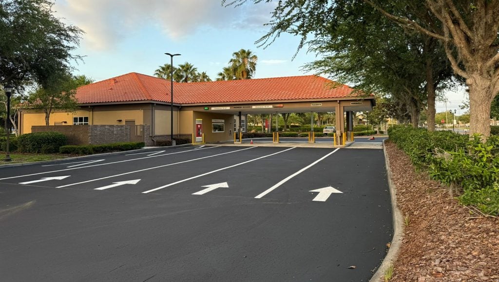 close-up of freshly painted arrows and lines for wells fargo parking lot