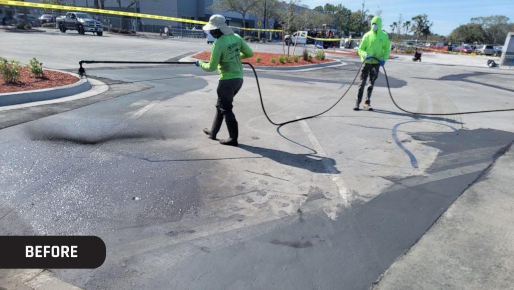 G-FORCE® employees installing asphalt sealcoating for Sam's Club parking lot