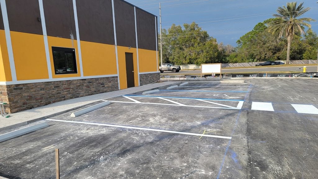 Coffee Shop parking lot with freshly painted parking spots