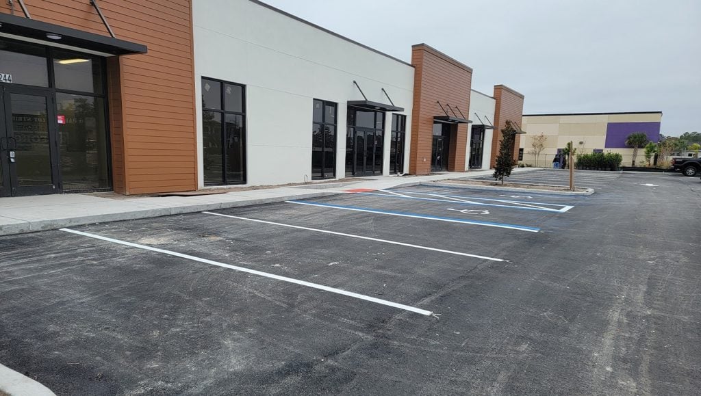 freshly painted parking spots for strip mall parking lot