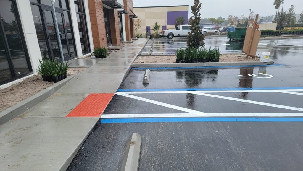 close-up of freshly painted line striping for strip mall