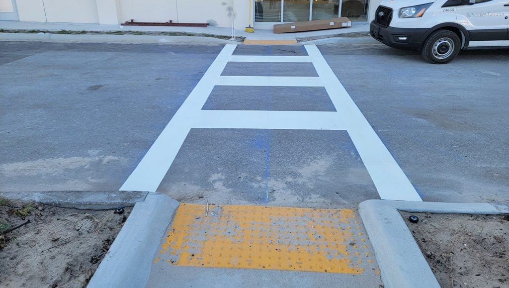 close-up front view of crosswalk freshly painted for Health Care Facility
